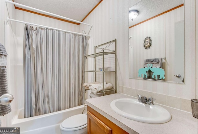 full bathroom with a textured ceiling, toilet, vanity, and shower / tub combo with curtain