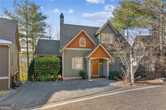 view of front of home featuring cooling unit