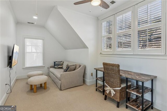 carpeted office space featuring ceiling fan and lofted ceiling