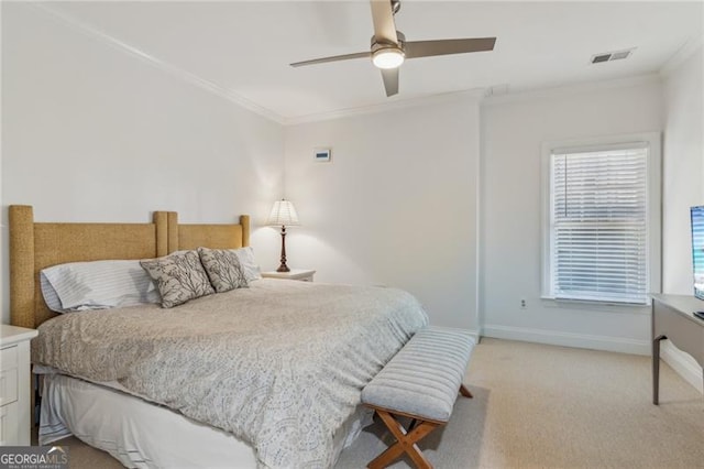 bedroom featuring light carpet, ceiling fan, and crown molding