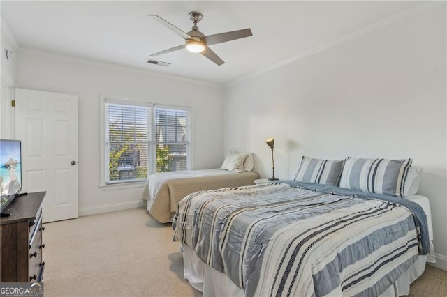 bedroom featuring light carpet, ceiling fan, and ornamental molding