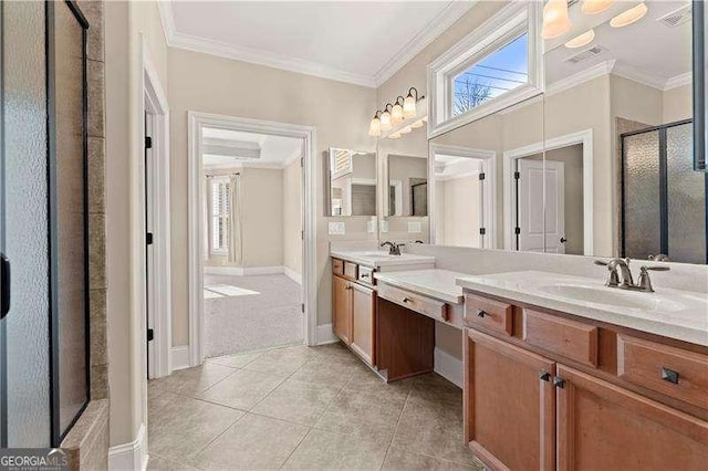 bathroom with tile patterned flooring, walk in shower, crown molding, and vanity