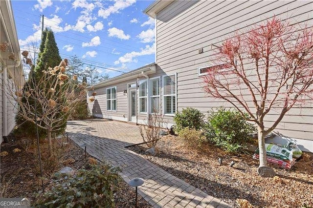 view of home's exterior with a patio area