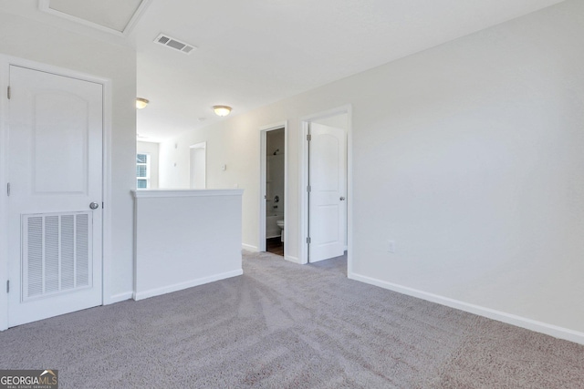 unfurnished room featuring carpet floors