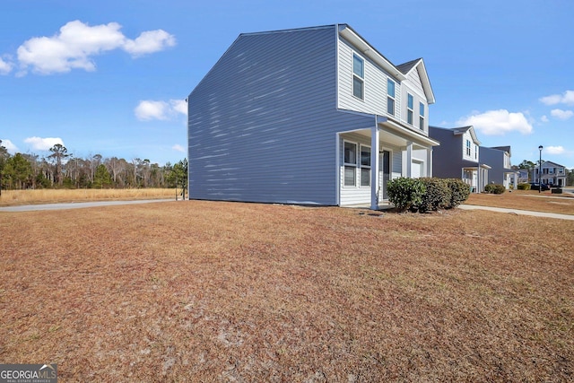 view of property exterior featuring a lawn