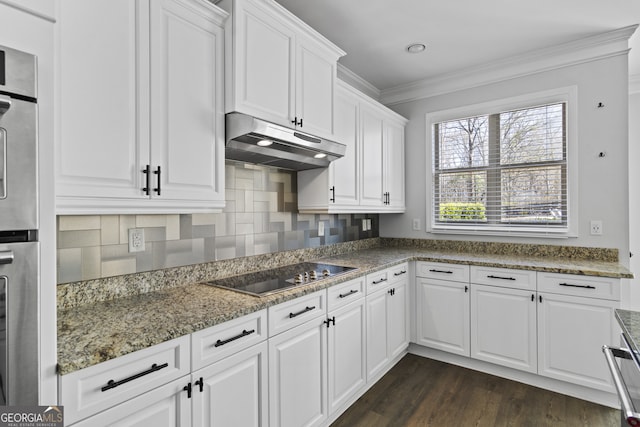 kitchen featuring white cabinetry, black electric stovetop, dark hardwood / wood-style floors, and tasteful backsplash