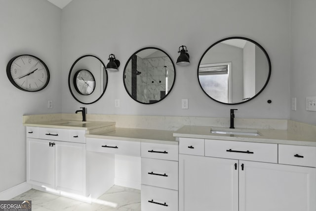 bathroom with a shower and vanity