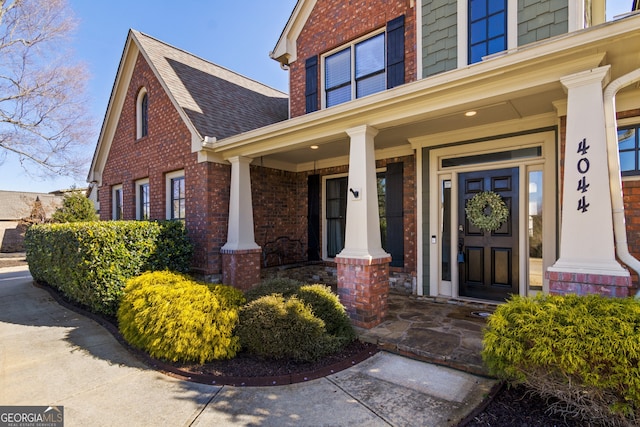 property entrance featuring a porch