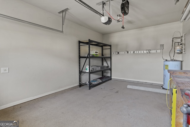 garage with electric water heater and a garage door opener