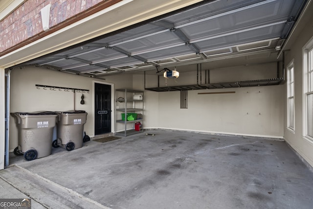 garage featuring a garage door opener