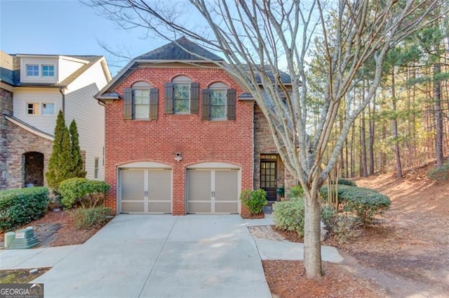 view of front of property with a garage