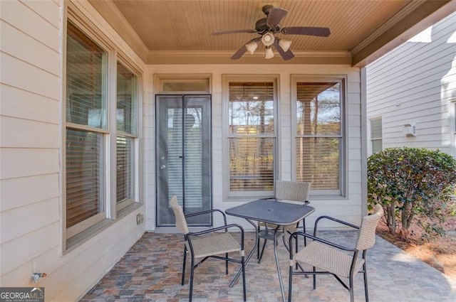 exterior space featuring wooden ceiling and ceiling fan