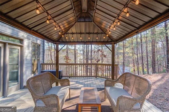 588 Myrtle Trace Ln, Suwanee, GA 30024 - sunroom featuring track lighting, an outdoor living space, and a wealth of natural light