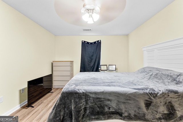 bedroom featuring ceiling fan and light wood-type flooring