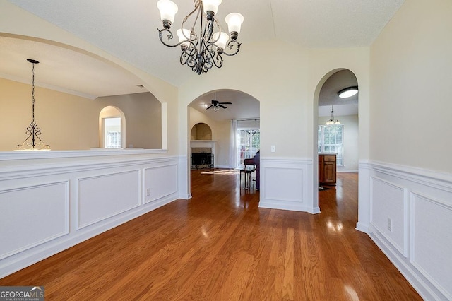 hallway with hardwood / wood-style flooring