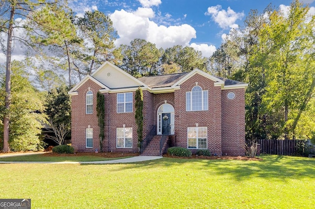 bi-level home featuring a front yard