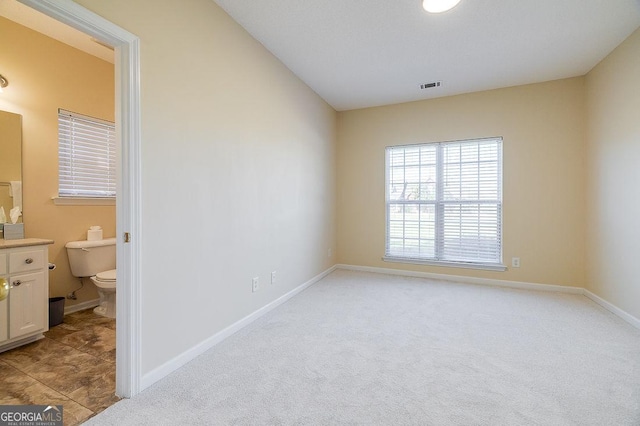 empty room with light carpet