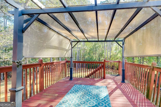 wooden deck with a pergola