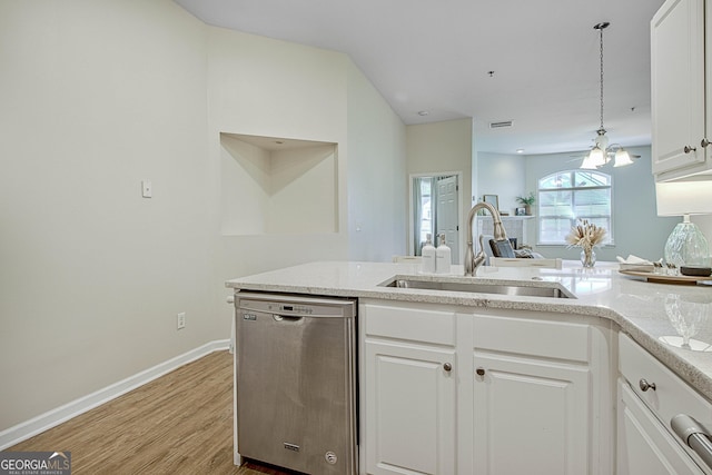 kitchen with light hardwood / wood-style floors, decorative light fixtures, dishwasher, white cabinets, and sink