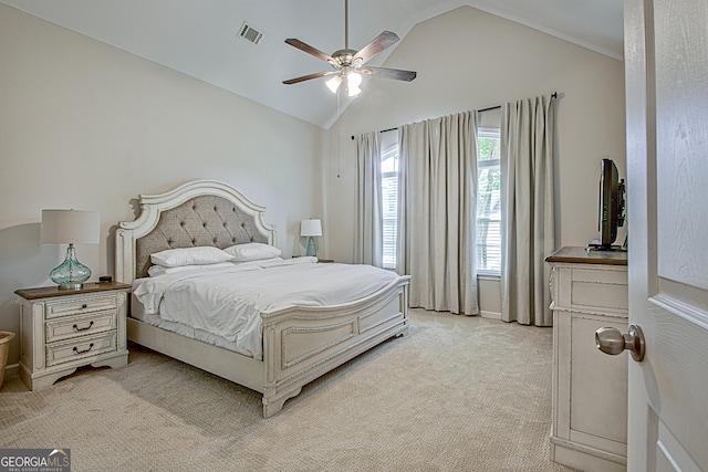 carpeted bedroom featuring ceiling fan and lofted ceiling