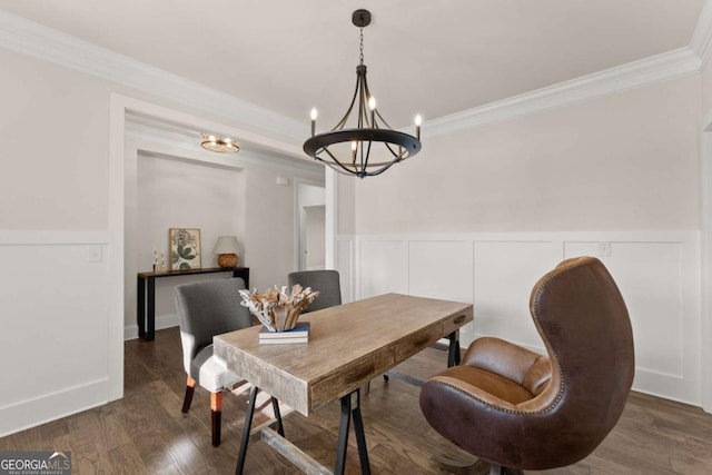5721 Brickhampton Ct, Clermont, GA 30527 - dining room featuring a chandelier, crown molding, wainscoting, dark wood finished floors, and a decorative wall