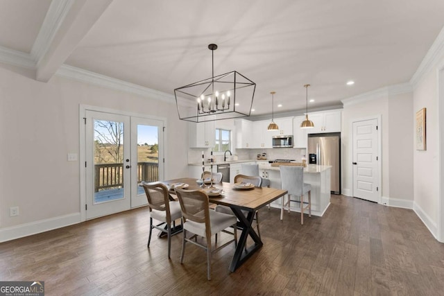 5721 Brickhampton Ct, Clermont, GA 30527 - dining space with dark wood-type flooring, baseboards, crown molding, a chandelier, and recessed lighting