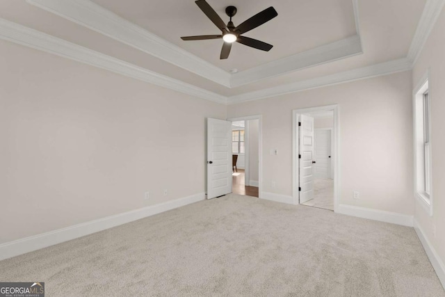5721 Brickhampton Ct, Clermont, GA 30527 - unfurnished bedroom featuring crown molding, carpet flooring, a raised ceiling, baseboards, and ensuite bath