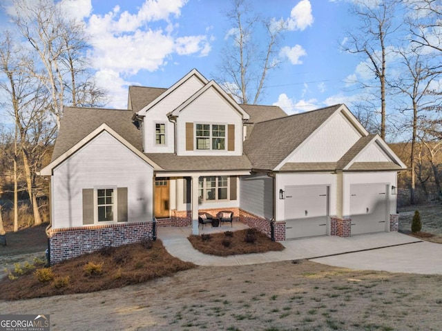 5721 Brickhampton Ct, Clermont, GA 30527 - view of front of house featuring brick siding, a garage, concrete driveway, roof with shingles, and a porch