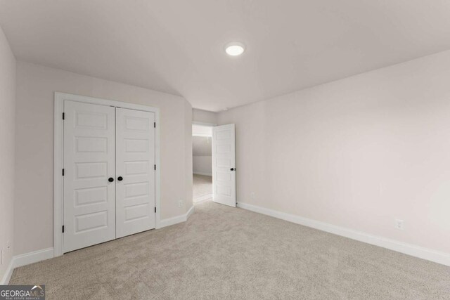 5721 Brickhampton Ct, Clermont, GA 30527 - unfurnished bedroom with carpet flooring and a closet