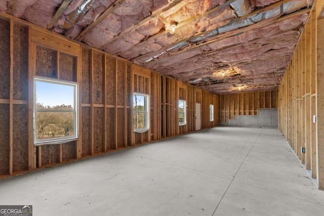 5721 Brickhampton Ct, Clermont, GA 30527 - miscellaneous room with healthy amount of natural light and concrete floors