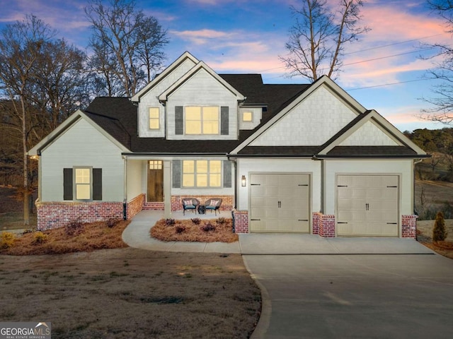 craftsman house with a garage