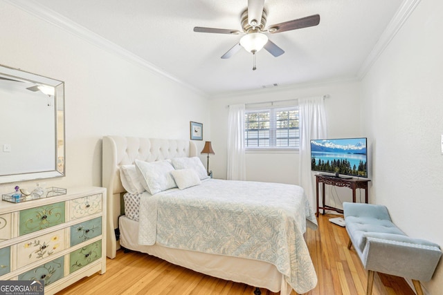 885 Briarcliff Rd NE Unit 21, Atlanta, GA 30306 - bedroom featuring ornamental molding, light wood finished floors, and a ceiling fan