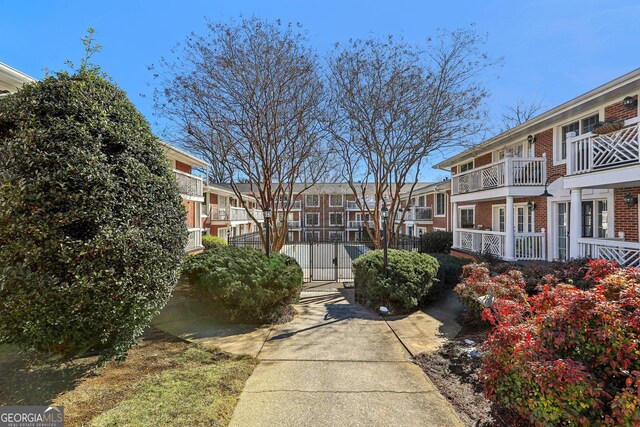 885 Briarcliff Rd NE Unit 21, Atlanta, GA 30306 - view of property's community featuring a residential view, a gate, and fence