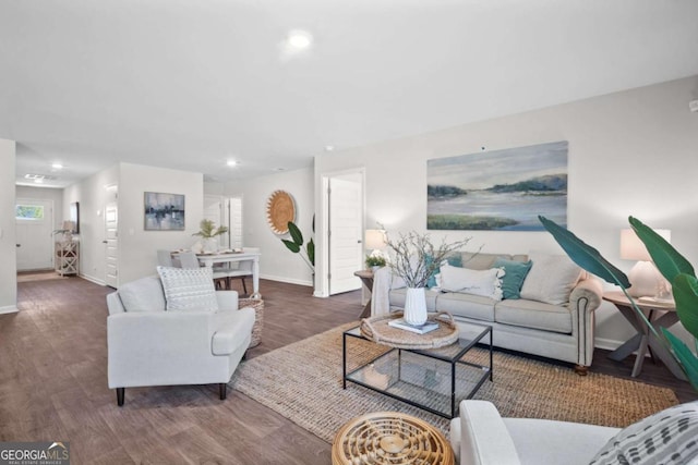 living room featuring dark hardwood / wood-style floors