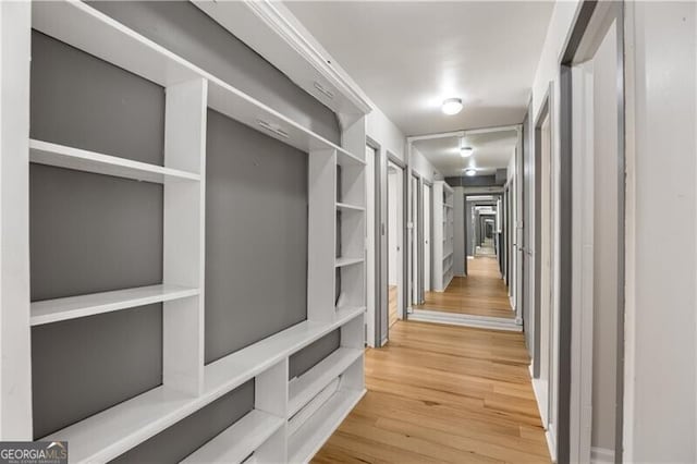 corridor with wood finished floors