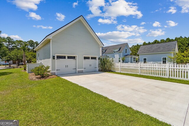 view of side of home featuring a lawn