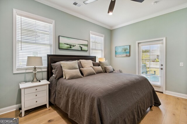 bedroom with light wood-type flooring, ceiling fan, access to exterior, and crown molding