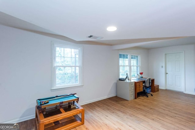 office featuring light hardwood / wood-style floors and billiards