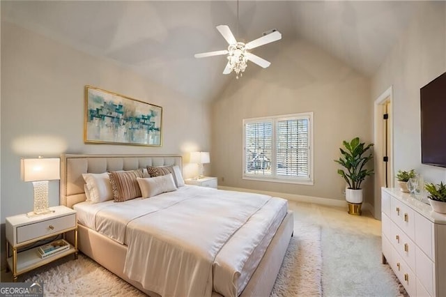 bedroom with light carpet, vaulted ceiling, and ceiling fan