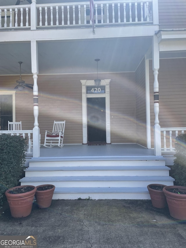 doorway to property with covered porch