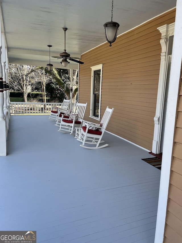 view of patio featuring covered porch and ceiling fan