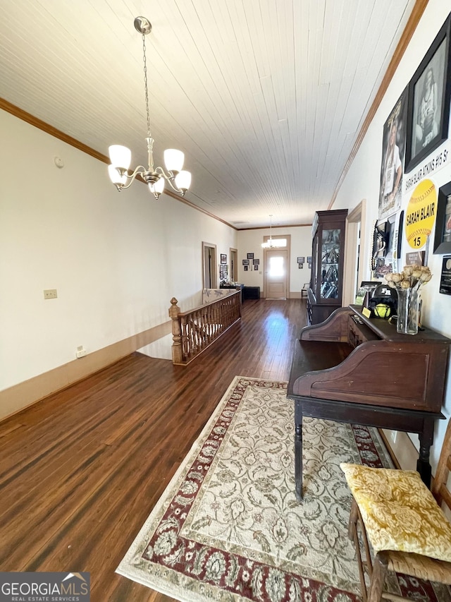 interior space featuring dark wood-type flooring, crown molding, wood ceiling, and an inviting chandelier