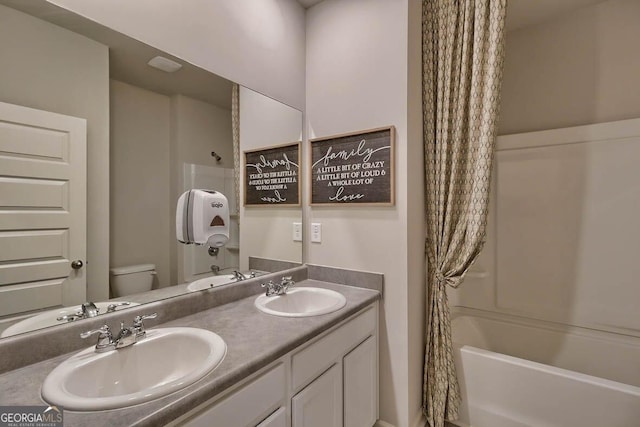 full bathroom with toilet, shower / tub combo, and vanity