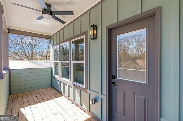 entrance to property featuring ceiling fan