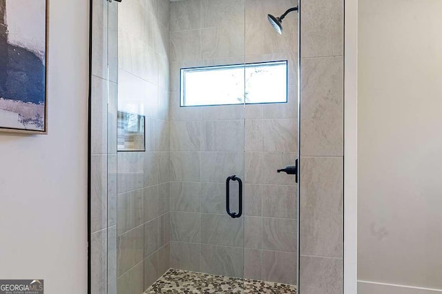 bathroom with an enclosed shower