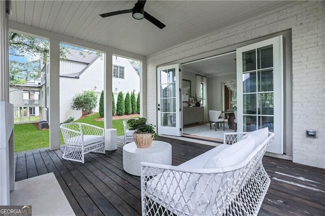 sunroom / solarium with ceiling fan