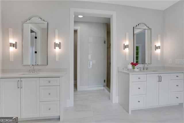 bathroom featuring vanity and a shower