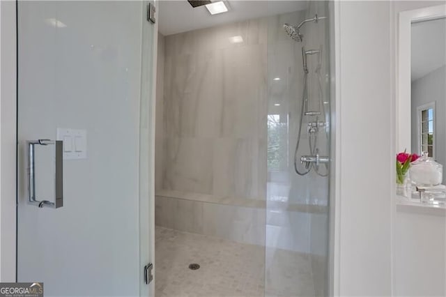 bathroom featuring walk in shower