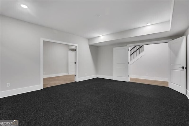 basement featuring carpet floors