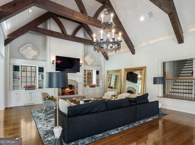 living room featuring a chandelier, beam ceiling, dark hardwood / wood-style flooring, and high vaulted ceiling